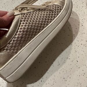 Steve Madden gold sneakers